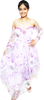 Woman wearing a strapless floral dress with purple accents on a white background