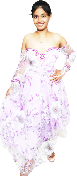 Woman wearing a strapless floral dress with purple accents on a white background