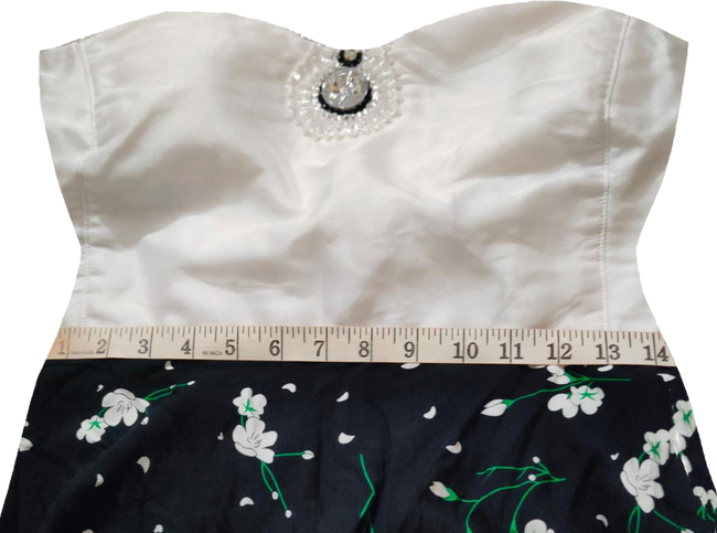 Off Shoulder White Top Floral Design Printed Skirt.