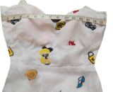 A Colorful Hand-Stitched Needle Work Beaded Design On White Back Ground