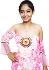 Woman wearing a pink floral off-shoulder dress with a white background