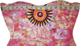 A woman wearing an off-shoulder pink gown Handmade beaded decorative with white patterns and beaded details.